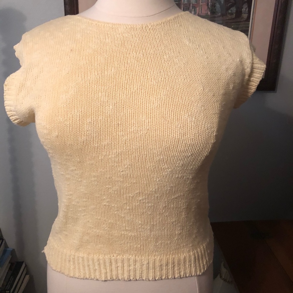 Yellow sleeveless sweater